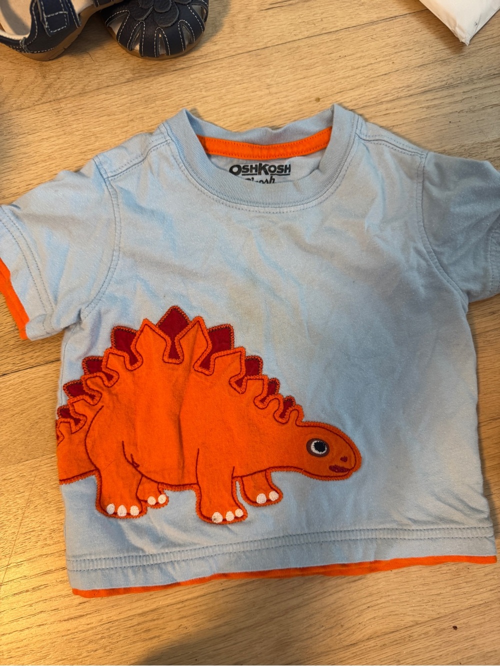 OshKosh B'gosh Light Blue Tee with Orange Stegosaurus Applique